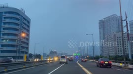 'Thermal inversion' smog shrouds Manila during rainy monsoon season in the Philippines