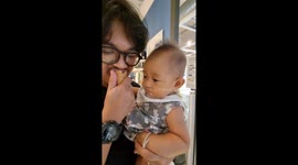 Give me some! Baby looks devastated each time dad bites ice cream cone