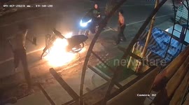 Motorcycle bursts into flames when owner tries to start it outside shop