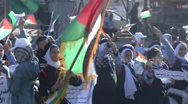Palestinian students participate in a scouting march marking the anniversary of Israeli disengagement from Gaza strip, in Gaza city