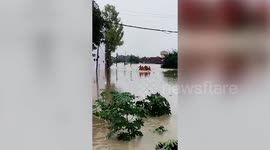 Indian firefighters come to rescue of locals trapped in flooded houses