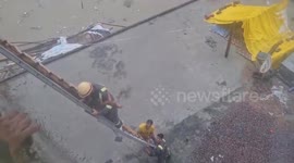 Stranded children rescued from flooded region in north India