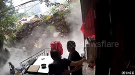 Chinese man's timely warning saves mother and child from collapsing wall