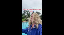 Woman SWIMS through flooded street after hurricane Idalia hits Florida