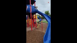 Toddler almost falls when he comes down the slide *Funny Toddler Slide Crash*