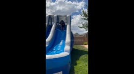 Fun uncle's epic waterslide adventure backfires when he fails to stick the landing!