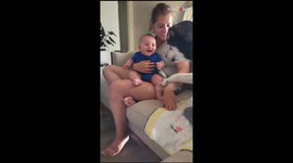 Adorable baby lets out contagious laughter when pet dog gives him attention