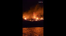 2023 Kelowna Forest Fire: Harrowing up-close shot of trees being torched at night