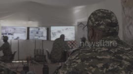 Palestinian armed wings attend a joint military exercise named 'Hard Corner 4' in Khan Younis city .