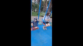 Mom Deftly Catches Son Falling From Swing