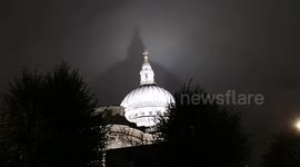 St Paul's Cathedral due to weather conditions casts a shadow on the clouds hovering above it.