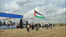 Palestinians demonstrate along the Israel-Gaza border