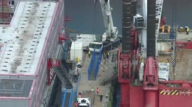 New gangway fitted on Bibby Stockholm barge in Portland, UK