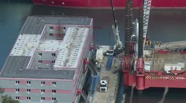 New gangway fitted on Bibby Stockholm barge in Portland, UK