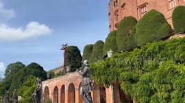 Gardeners spend 10 weeks using cherry picker to trim 300-year-old hedges at Powis Castle, UK