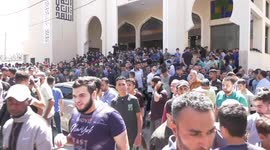 Palestinians carry body of teenager killed in explosion at border with Israel