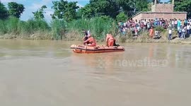 Officials conduct rescue operation after boat capsizes in northern India