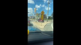 Tiny Car Crosses The Street