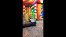 Carnival Ride Hilariously Traps Woman On Moving Walkway