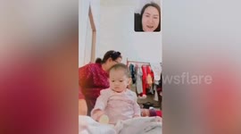 Grandmother accidentally pushes baby's head while video calling with mum