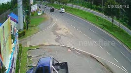 Car flips over while avoiding detached truck gear bouncing on road