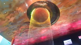 An amazing water fountain with water that changes color and patterns due to magical lighting at a Thai shopping mall.