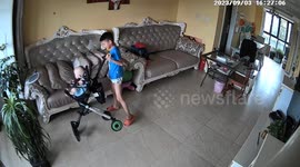 Boy tries his best but fail to save young brother from overturned stroller