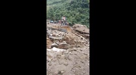 The village was destroyed and buried under rocks after the flash flood passed
