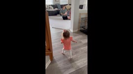 Precious toddler beaming with excitement while meeting newborn sister for the 1st time!