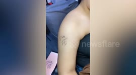 Female fan has Post Malone's signature tattooed on her arm