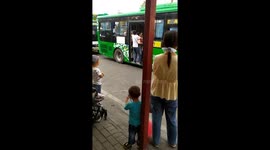 Passenger's hilarious way of boarding overcrowded bus