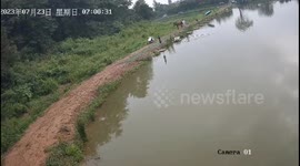Horseplay Leads to Unexpected Dip In Fuyu Town, Susong County, China