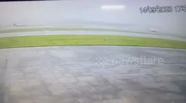 Terrifying moment private plane carrying eight people skids off runway amid bad weather