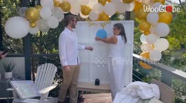 Lovely couple plays a nail-biting game of Tic Tac Toe to find out their baby's gender