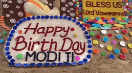 50 Konark wheel installed on sand to wish PM Modi