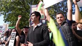 Protesters gather outside Iranian embassy on anniversary of death of Mahsa Amini in London, UK
