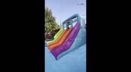 Girl's waterslide adventure ends with her getting tossed out of pool