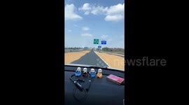 Chinese villagers transform road into massive grain-drying zone, blocking traffic