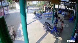 Naughty little girl kept from riding motorbike kicks older brother in family jewels