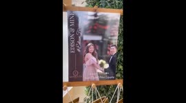 Wedding couple lavish their guests with 18k gold coins and Michael Kors watches