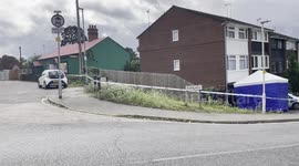 Woman, 35, appears in court charged with murder of her parents in UK