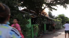 Firework warehouse explodes damaging homes and vehicles in Thailand