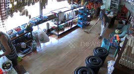 Ghost seat moves while shopkeeper sweeps floor