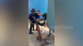 Worker stuck inside empty tank container rescued