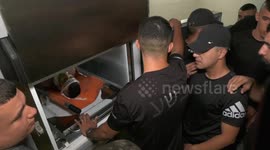 Palestinians mourn the bodies of three martyrs in the West Bank city of jenin