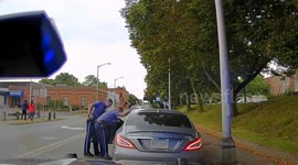 Suspect Massachusetts drags state trooper along road during traffic stop