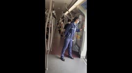 Monorail travels with doors wide open as worried passengers hold on for their lives