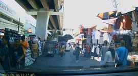 E-bike takes a tumble while travelling through market