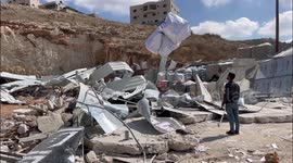 Israeli occupation forces demolish the building of the “Al-Betawi Contracting and Building”