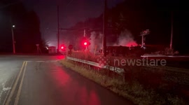 Freight train hits overturned concrete truck in Bucks County PA